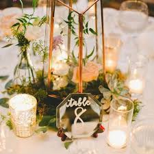 Terrarium containers terrarium ideas planter ideas glass terrarium succulent terrarium terrariums plant centerpieces stone landscaping small potted plants. 19 Terrarium Centerpieces For The Seriously Cool Couple