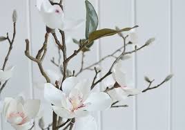 Create a large silk flower arrangement for a bar, a hotel lobby, or a wedding or event centerpiece, with these magno. Artificial Magnolia Branch With Leaves Flowers And Buds From The White Lighthouse Home Furniture And Interiors