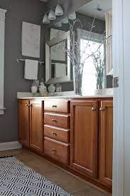 Browse bathroom designs and decorating ideas. Blog With Ideas For Decorating Dwellings By Devore Master Bathroom Bathroom Wall Colors Gray Bathroom Walls Honey Oak Cabinets