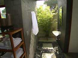 Found on the floors, along the walls as wainscot, and as the tub surround, this material unifies the area. Indoor Outdoor Bathroom Hgtv