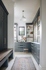 No mud room design is complete without a bench or some sort of seating to sit and remove shoes. Pantry And Mudroom Combo Design Ideas
