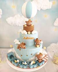 You'll find here cheap baby shower ideas from invitations to favors. Baby Shower Cake For Baby Boys Teddy Bears Hot Air Balloon Train Cake Bear Baby Shower Cake Baby Shower Cakes For Boys Boy Birthday Cake