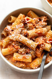 This Italian Sausage Rigatoni With A Light Tomato Cream Sauce Is So Easy To Make Perfect For B Sausage Rigatoni Recipes Sausage Rigatoni Sausage Pasta Recipes