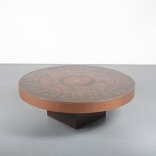 This luxury coffee table organ combines rich wood with bright copper legs. 1970s Etched Copper Coffee Table From Italy 128753