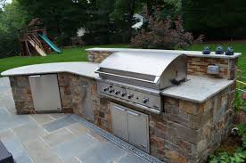 The luxury outdoor bbq grill and bar area features a 60 in tv attached to a hydraulic lift. Custom Outdoor Bar Houzz