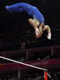Aai® international elite™ horizontal bar Team Usa S Danell Leyva Competes On The High Bar At The London Olympics During The Men S Gymnastics Event F Boys Gymnastics Gymnastics Photography Male Gymnast