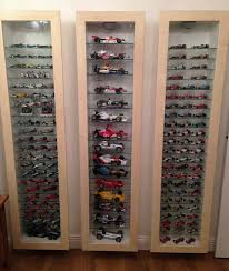 Formula 1 Collection World Champions In The Cabinet To The Right Diecast Cars Display Hot Wheels Display Hot Wheels Storage