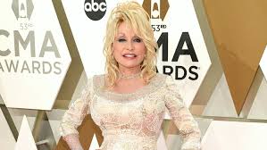 Country music legend dolly parton spoke to robin roberts for the abc news special, dolly parton: The Real Reason Dolly Parton Always Wears Long Sleeves