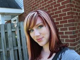 The look is finished off with straight across bangs. 25 Elegant Blonde And Red Hairstyles Slodive
