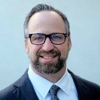 Texas newspaper publisher John Garrett tells us why 'Print Ain't Dead'