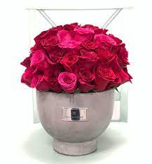 New To Our Local Delivery Lineup The Red And Fuchsia Rose Centerpiece Call The Number In Bio To Order Flower Delivery Rose Centerpieces Pretty Flowers