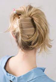 Cute And Easy Hairstyles You Can Do With One Stick Try This Fun Flirty Tails Out Twist For A Quic Hairstick Hairstyles Hair Styles Lemonade Braids Hairstyles