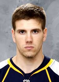 Player photos for the 2000-01 Strathroy Rockets at hockeydb.com