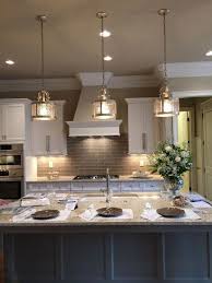 Chandelier lighting also hangs from the ceiling but features a branched system with many lights as opposed to one light like pendants. Boho Kitchen Island Lighting Novocom Top