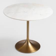 A Luxe New Update To Our Leilani Table A World Market Favorite This Piece Features A Round Marble Tulip Dining Table Dining Table Marble Marble Tulip Table