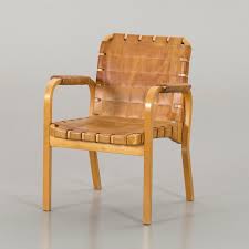 Rattan or leather windings, quilted leather or fabric. Alvar Aalto Armchair Modell Nr 45 Bought 1950s Bukowskis
