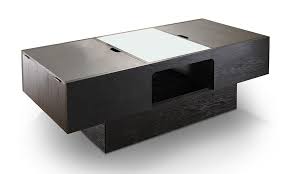 An upholstered ottoman can serve as a coffee table and bring a cozy touch to a room, while a sleek marble coffee table adds instant elegance and sophistication. Black Finished Wood And Glass Hidden Storage Coffee Table From Aed 799 A To Z Furniture