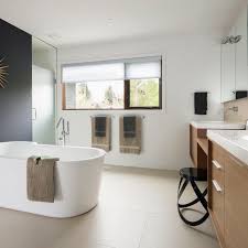 The slate tile, the tankless toilet, the modern vases in the window. 14 Ideas For Modern Style Bathrooms