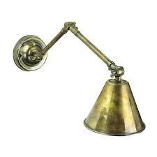 Light them up to create a charming atmosphere, or if the power goes out, you will know right where the wall kerosene lanterns are. Vintage Dual Adjustable Wall Light In Antique Brass Finish