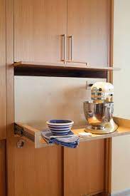 Really i only use two different knives consistently throughout the day: Modern Kitchen By Rom Architecture Studio Kitchen Appliance Storage Modern Kitchen Kitchen Design