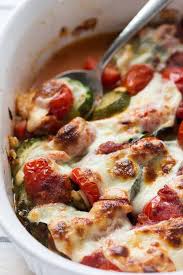 Baked Zucchini With Mozzarella And Tomatoes Is A Light And Easy Side Dish And Makes A Perfect Addition To Your Summer Dinn Recipes Baked Tomatoes Bake Zucchini