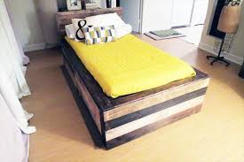 The finishing touch to the bed is a live edge headboard that adds a rustic but still modern feel. Wood Pallet Twin Bed With Headboard Pallet Furniture Plans