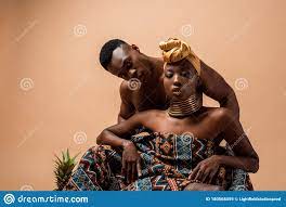 Naked Tribal Afro Woman Covered in Blanket Posing Near Man on Beige Stock  Image - Image of muscular, girl: 180568459