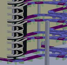 대형 물류 센터 내부에 설치된 듀얼 트랙 스파이럴 컨베이어, 박스가 끊김 없이 위층으로 이송되는 역동적인 모습