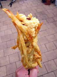 French Fry Coated Hot Dog On A Stick Gourmet Hot Dogs Fair Food Recipes Hot Dog Recipes