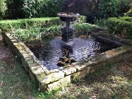 Pond Safety Net On Sandstone Fountain Backyard Safety Pond Natural Pond