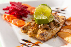 We picked our own herbs, husked coconuts, ground out the coconut meat, made coconut milk, and combined it all with local fish. Belizean Food Typical And Traditional Things To Try