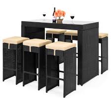 A small patio dining set or bistro set works better for a narrow balcony or courtyard. Best Choice Products 7 Piece Outdoor Rattan Wicker Bar Dining Patio Furniture Set With Glass Table Top And 6 Stools Black Brickseek