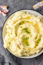 Simple and straight forward just how mashed potatoes should be. Creamy Garlic Mashed Potatoes The Dinner Bite