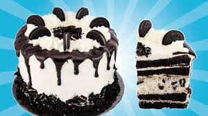 An easy chocolate cake to topped with oreo crumbs, a marshmallow frosting, and a cute splash of milk made from white chocolate. Oreo Cake Recipe From Cookies Cupcakes And Cardio Youtube