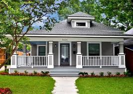 Trees crowded this house, the veranda's railing was missing, and a lack of landscaping made the house unwelcoming. 9 House Makeovers That Are Almost Unbelievable Bob Vila