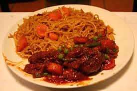 Rebus santan, bumbu halus, lengkuas, dan serai sambil diaduk. Ayam Masak Merah Wikipedia