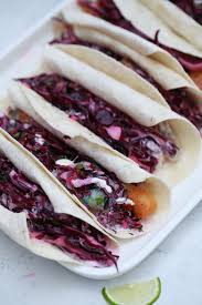 These grilled mahi mahi fish tacos are epic but the avocado tomatillo salsa on top is what makes them shine. Crispy Mahi Mahi Tacos With Red Cabbage Slaw Scrambled Chefs