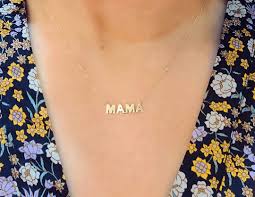 The script is dainty, and it is an ideal layering piece. 8m11dy 150n 14k Yellow Gold Diamond Mama Necklace 0 02ct Svs Fine Jewelry