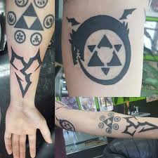 Ffx Zanarkand Abes Fma Homunculus Ouroboros I Got Electric Voodoo Tattoo By Jeff Ouroboros Tattoo Voodoo Tattoo Tattoos