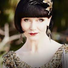 The supremely elegant miss fisher is the lady detective star of the popular phryne fisher murder mysteries, created by author kerry greenwood. Pin Auf The Honorable Phryne Fisher Lady Detective