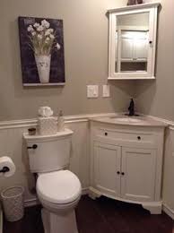 This is a contemporary style bathroom with wooden cabinets and glossy deco countertops in white. 46 Corner Bathroom Sinks Ideas Corner Sink Corner Sink Bathroom Small Bathroom