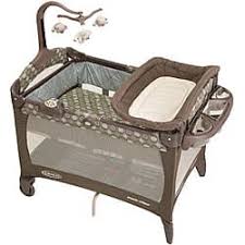 So the first thing you want to do is lay it down on its side. Graco Pack N Play Playard In Barcelona Bluegrass Overstock 4812890