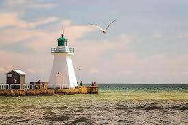 Fancy yachts and fishing tugs. Port Dover Pier Photograph By Sandra Barbour