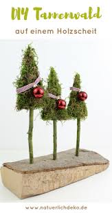 Tannenbaume Mit Moos Auf Holzscheit Als Weihnachtliche Deko Idee Moos Baseln Mit Moos Weihnachtsdeko W Holzscheit Weihnachtlich Dekorieren Weihnachten 2017