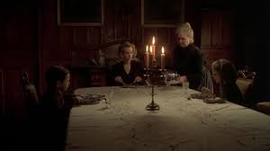 The men prepare for their meal. 14 Best Haunted House Movies Reelrundown