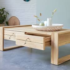 Very practical, it is equipped with 4 drawers and a large lower shelf. Teak Coffee Table Minimalys Coffee Tables 120x70 At Tikamoon