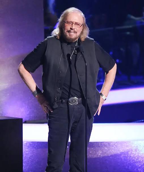Who is Barry Gibb, how old is he, what's his net worth and what are his biggest songs with the Bee Gees'?
