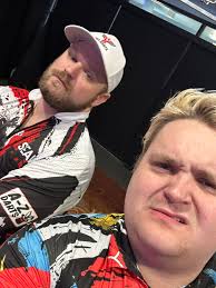 Who are the individuals in the photo?