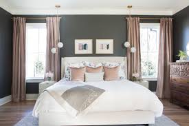 Dark blue grass cloth walls and drapery in an abstract watery blue and ivory pattern lend softness to the space. Charcoal And Blush Master Bedroom Transitional Bedroom Other By Lindsey Black Interiors Houzz