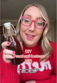My kids loved helping with these jars! @Jamielyn Nye #christmas  #diychristmas #homemadevanilla #vanillaextract #christmascookies #cookiejar  #hostessgift #teachergift